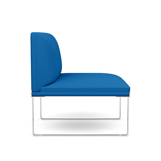 Side view of the SitOnIt Cameo Club Chair armless in blue fabric with chrome Frame. Kansas City Office Design