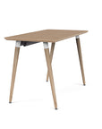 Side view of the SitOnIt Reya Office Desk with Angled Legs. The legs are tapered bamboo with a bamboo top. Kansas City Office Furniture