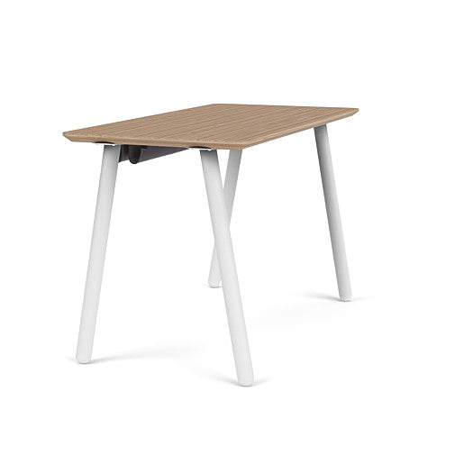 Side view of the SitOnIt Reya Office Desk with Angled Metal Legs. The legs are white with a bamboo top. Kansas City Office Furniture