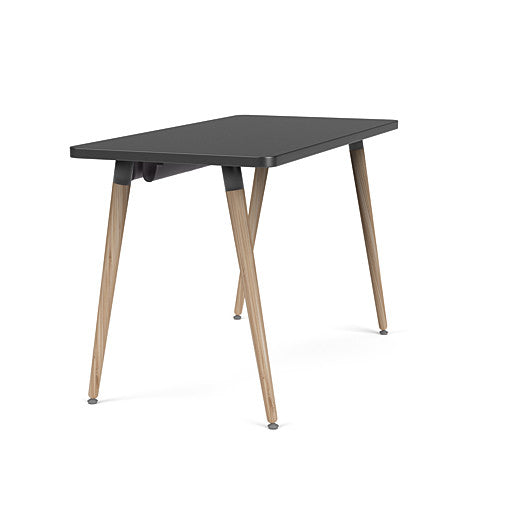 Side view of the SitOnIt Reya Office Desk with Angled Legs. The legs are tapered Bamboo with a black top. Kansas City Office Furniture