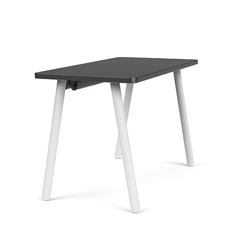 Side view of the SitOnIt Reya Office Desk with Angled Metal Legs. The legs are white with a black top. Kansas City Office Furniture