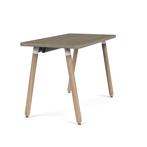 Side view of the SitOnIt Reya Office Desk with Angled Legs. The legs are bamboo with a sandalwood top. Kansas City Office Furniture