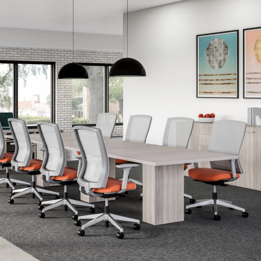Modern office conference room with a long table and chairs. Kansas City Office Design.