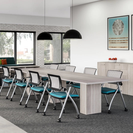 Modern office conference room with long table and chairs. Kansas City Office Design.