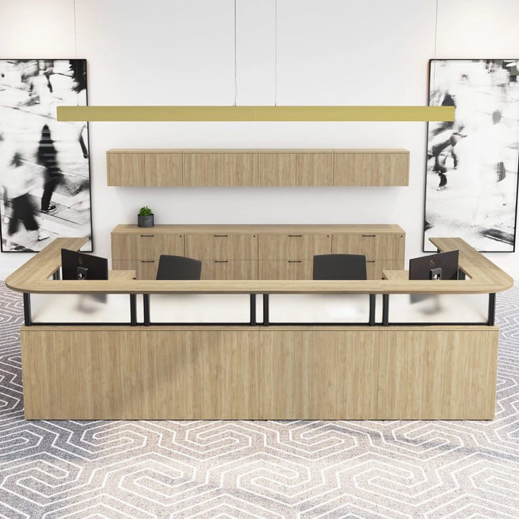 Modern office reception desk with glass panels and wooden finish in a minimalistic office setting. Kansas City Office Design