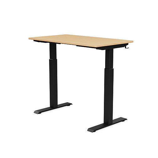 Back view of the SitonIt Switchback Height Adjustable Sit-to-Stand Desk. It has a Black base with a 24"D x 42"W Maple top - Kansas City Office Furniture