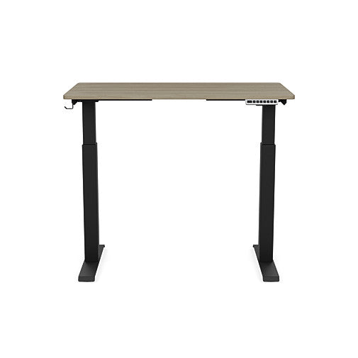 Front view of the SitonIt Switchback Height Adjustable Sit-to-Stand Desk. It has a Black base with a 24"D x 42"W Sandalwood top - Kansas City Office Furniture