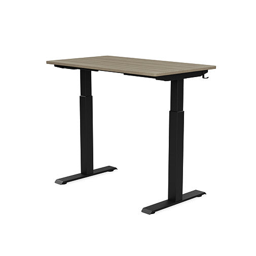 Back view of the SitonIt Switchback Height Adjustable Sit-to-Stand Desk. It has a Black base with a 24"D x 42"W Sandalwood top - Kansas City Office Furniture