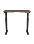 Front view of the SitonIt Switchback Height Adjustable Sit-to-Stand Desk. It has a Black base with a 24"D x 42"W Walnut top - Kansas City Office Furniture