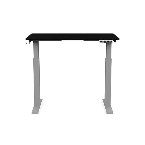 Front view of the SitonIt Switchback Height Adjustable Sit-to-Stand Desk. It has a Silver base with a 24"D x 42"W Black top - Kansas City Office Furniture