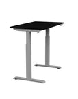 Side view of the SitonIt Switchback Height Adjustable Sit-to-Stand Desk. It has a Silver base with a 24"D x 42"W Black top - Kansas City Office Furniture