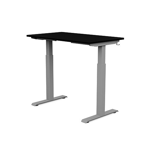 Back view of the SitonIt Switchback Height Adjustable Sit-to-Stand Desk. It has a Silver base with a 24"D x 42"W Black top - Kansas City Office Furniture