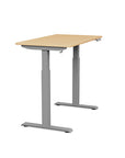 Side view of the SitonIt Switchback Height Adjustable Sit-to-Stand Desk. It has a Silver base with a 24"D x 42"W Maple top - Kansas City Office Furniture