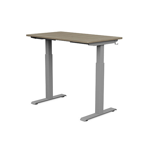 Back view of the SitonIt Switchback Height Adjustable Sit-to-Stand Desk. It has a Silver base with a 24"D x 42"W Sandalwood top - Kansas City Office Furniture