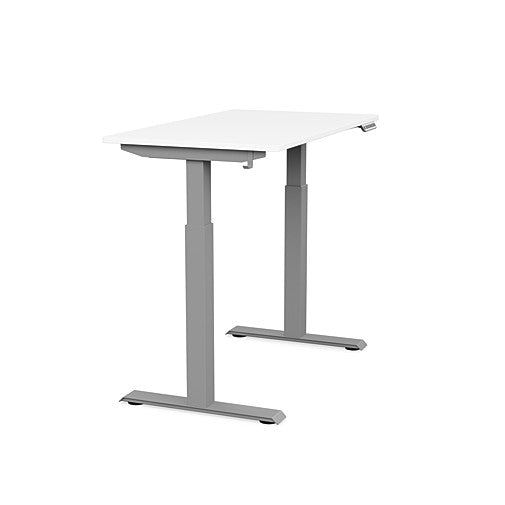 Side view of the SitonIt Switchback Height Adjustable Sit-to-Stand Desk. It has a Silver base with a 24"D x 42"W White top - Kansas City Office Furniture