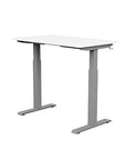 Back view of the SitonIt Switchback Height Adjustable Sit-to-Stand Desk. It has a Silver base with a 24"D x 42"W White top - Kansas City Office Furniture