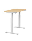 Side view of the SitonIt Switchback Height Adjustable Sit-to-Stand Desk. It has a White base with a 24"D x 42"W Maple top - Kansas City Office Furniture