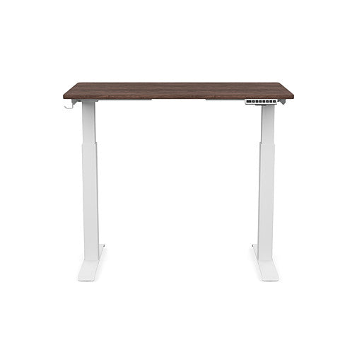 Front view of the SitonIt Switchback Height Adjustable Sit-to-Stand Desk. It has a White base with a 24"D x 42"W Walnut top - Kansas City Office Furniture