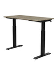 Back view of the SitonIt Switchback Height Adjustable Sit-to-Stand Desk. It has a Black base with a 24"D x 48"W Sandalwood top - Kansas City Office Furniture