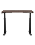 Front view of the SitonIt Switchback Height Adjustable Sit-to-Stand Desk. It has a Black base with a 24"D x 48"W Walnut top - Kansas City Office Furniture