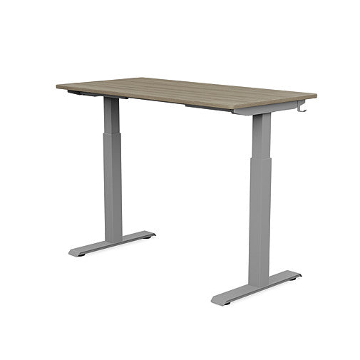 Back view of the SitonIt Switchback Height Adjustable Sit-to-Stand Desk. It has a Silver base with a 24"D x 48"W Sandalwood top - Kansas City Office Furniture