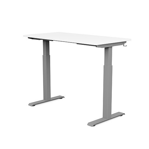 Back view of the SitonIt Switchback Height Adjustable Sit-to-Stand Desk. It has a Silver base with a 24"D x 48"W White top - Kansas City Office Furniture