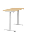 Side view of the SitonIt Switchback Height Adjustable Sit-to-Stand Desk. It has a White base with a 24"D x 48"W Maple top - Kansas City Office Furniture