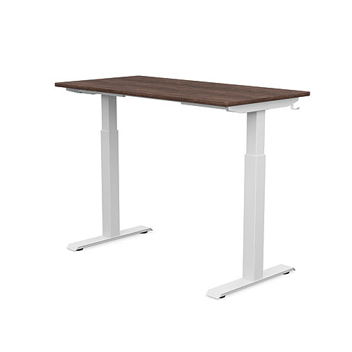 Back view of the SitonIt Switchback Height Adjustable Sit-to-Stand Desk. It has a White base with a 24"D x 48"W Walnut top - Kansas City Office Furniture
