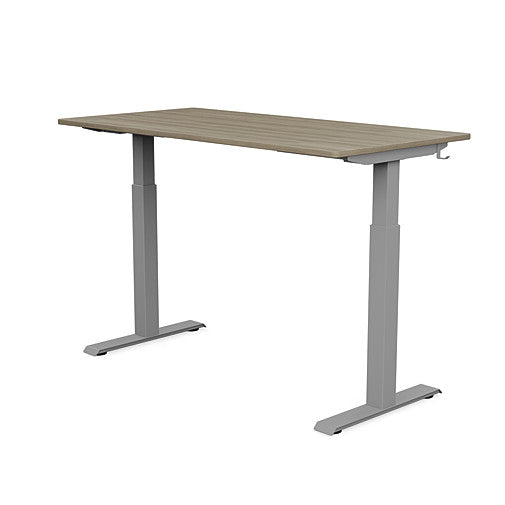 Back view of the SitonIt Switchback Height Adjustable Sit-to-Stand Desk. It has a Silver base with a 27"D x 54"W Sandalwood top - Kansas City Office Furniture