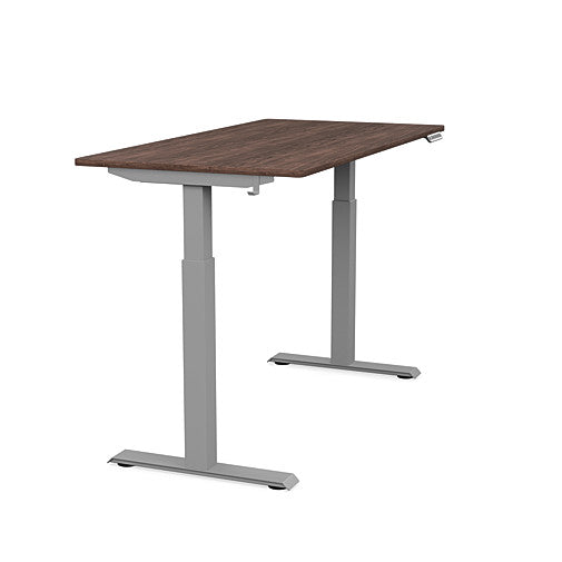 Side view of the SitonIt Switchback Height Adjustable Sit-to-Stand Desk. It has a Silver base with a 27"D x 54"W Walnut top - Kansas City Office Furniture