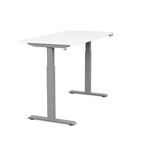 Side view of the SitonIt Switchback Height Adjustable Sit-to-Stand Desk. It has a Silver base with a 27"D x 54"W White top - Kansas City Office Furniture