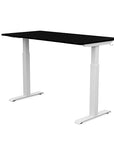 Back view of the SitonIt Switchback Height Adjustable Sit-to-Stand Desk. It has a White base with a 27"D x 54"W Black top - Kansas City Office Furniture