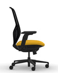 Side view of the 9to5 Tori Highback ergonomic task chair in black frame, yellow fabric, and black mesh. Kansas City Office Design.
