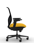 Side view of the 9to5 Tori Midback ergonomic task chair in black frame, yellow fabric, and black mesh. Kansas City Office Design.