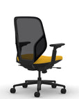 Back view of the 9to5 Tori Midback ergonomic task chair in black frame, yellow fabric, and black mesh. Kansas City Office Design.