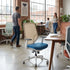 Open office with big windows in a modern office and task chairs. Kansas City Office Design.
