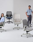 A selection of the Tori Task Chair with two people. Kansas City Office Design.