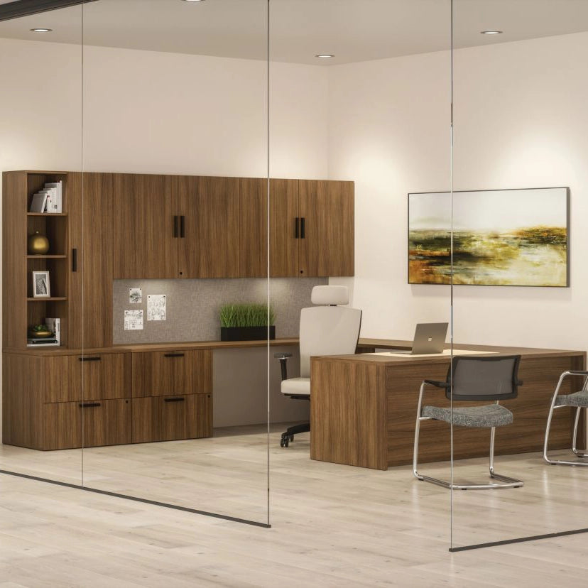 Modern office interior with wooden furniture, glass walls, and a painting on the wall. Kansas City Office Design.