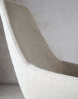 Close-up of a Via Astro Lounge chair with a neutral color palette on a plain background. Kansas City Office Design.