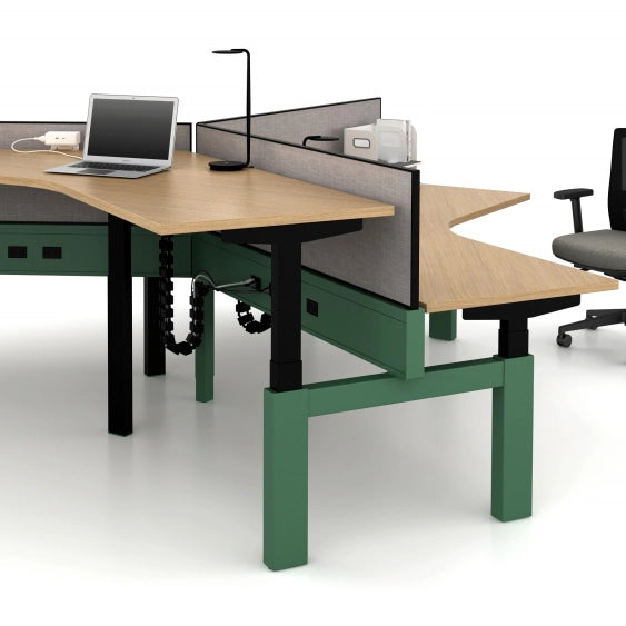 Modern office power bench sit to stand desk setup in 120 degrees with green legs, wooden surface, and office chair on a white background. Kansas City Office Design.