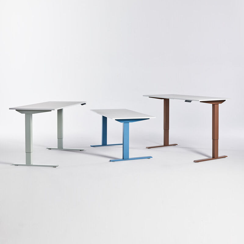 eFloat Go 2.0 Sit-Stand Height Adjustable Desks in various color ways and adjusted height positions. White laminate tops. Kansas City office furniture.