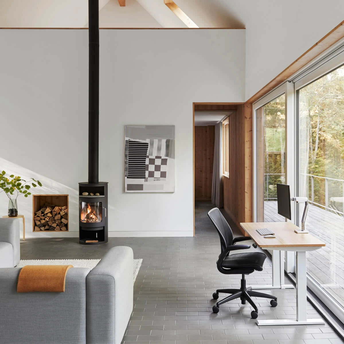 Home Office with a Humanscale World Chair with black mesh, black frame, side view. Kansas City Office Design