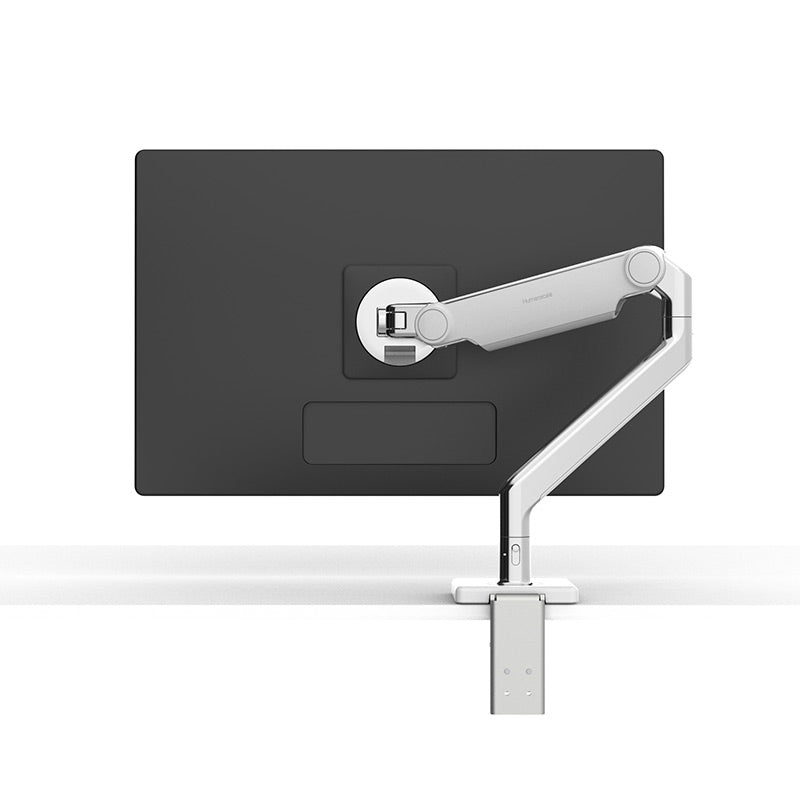 Humanscale M2.1 single monitor arm back view on desk