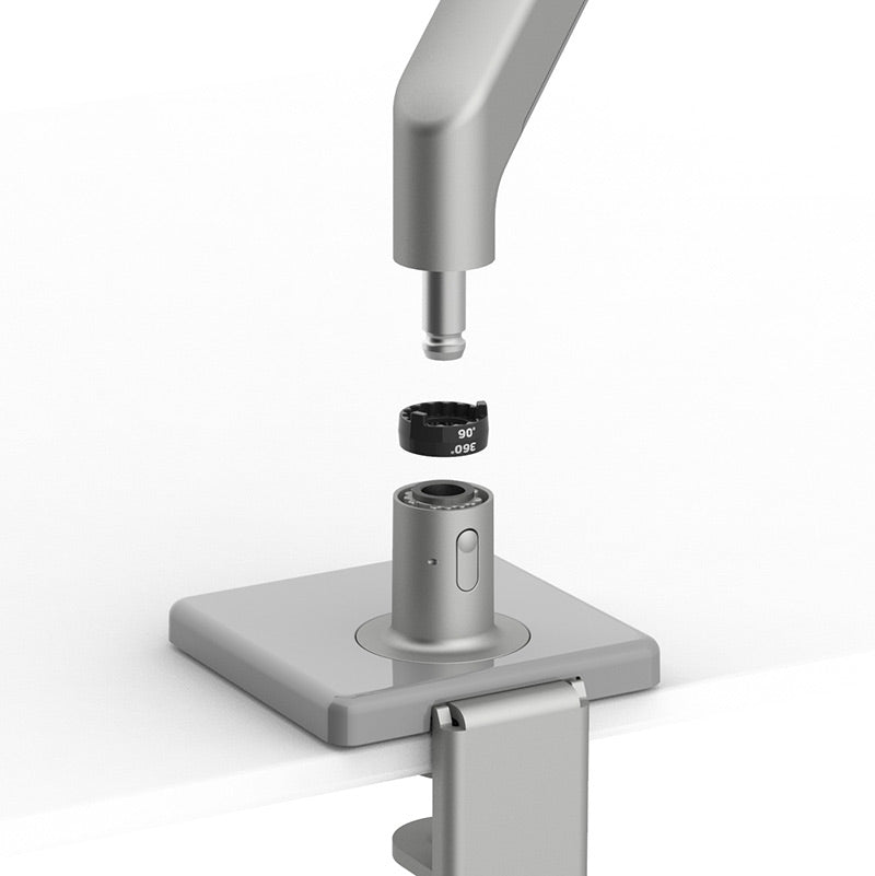 Closeup of Humanscale M8.1 monitor arm swivel adjustment in silver and grey trim