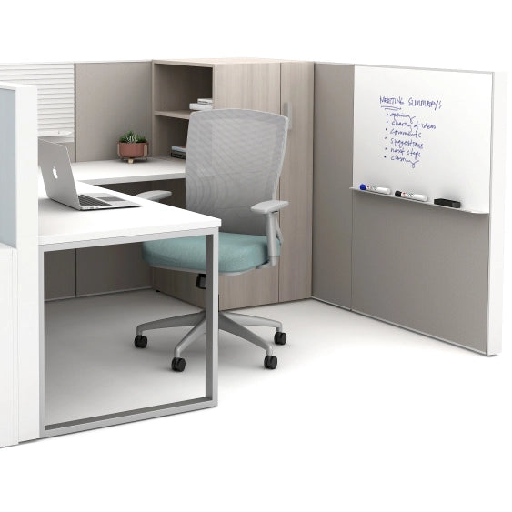 Modern office setup with a desk, chair, and whiteboard in a neutral color scheme. Kansas City Office Design