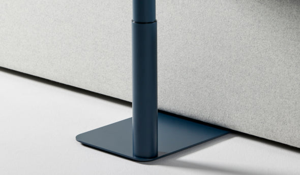 The base of a slate blue Humanscale Float micro height adjustable table on glides. Kansas City Office Design.