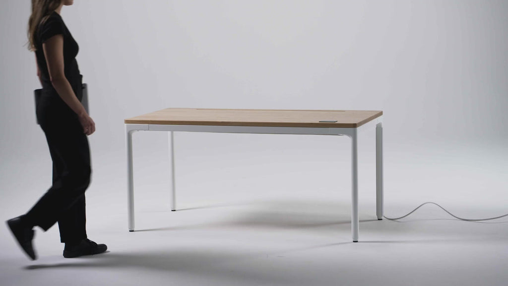 Video of how the Humanscale eFloat Quattro Height Adjustable Table works. Kansas City Office Design.