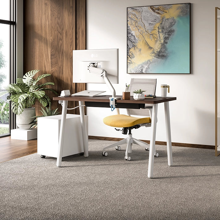Modern home office with a SitonIt Reya desk, chair, and decorative elements. Kansas City Office Design.