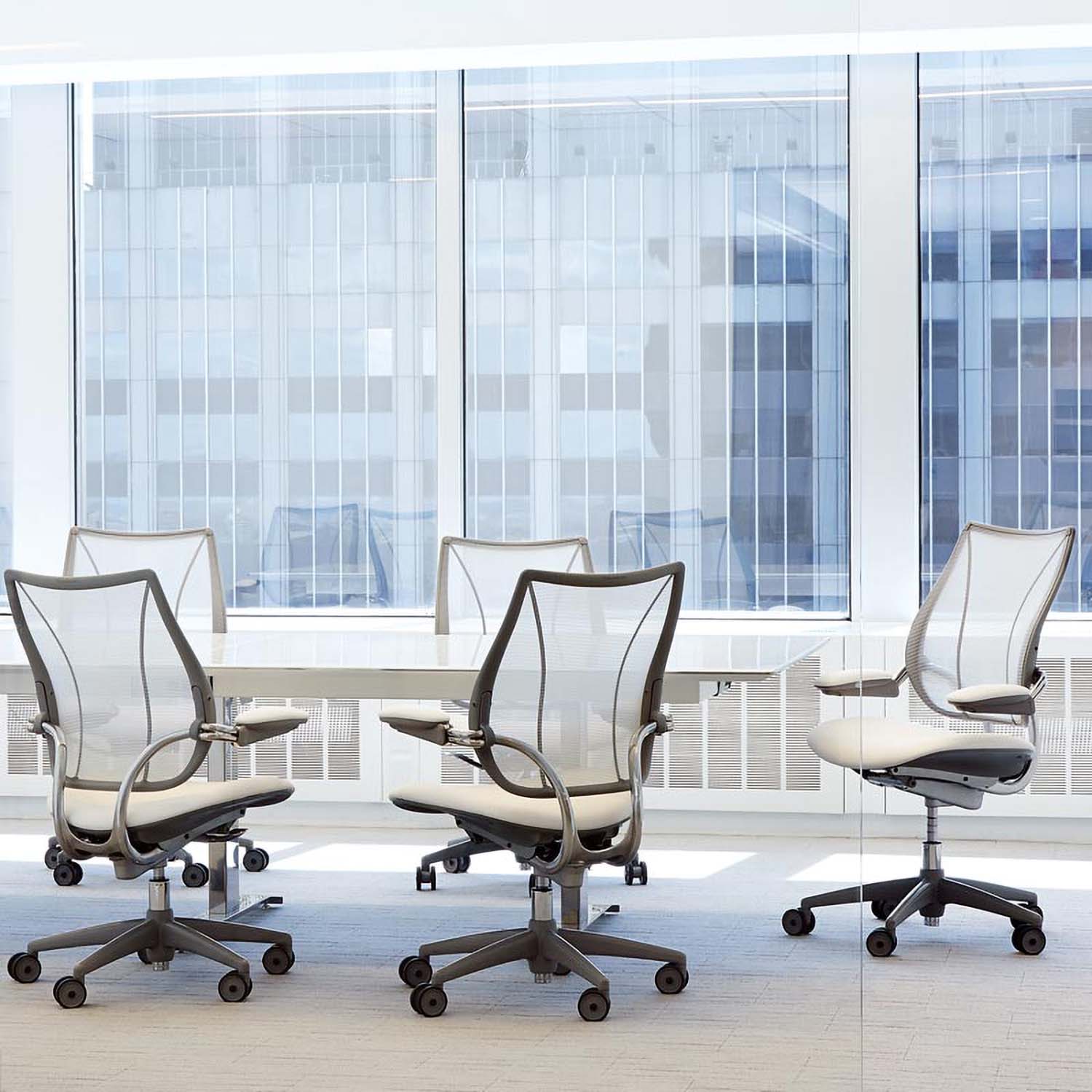 HumanScale Liberty desk Chair around conference table. Ergonomic Desk chair Kansas City Office Furniture.
